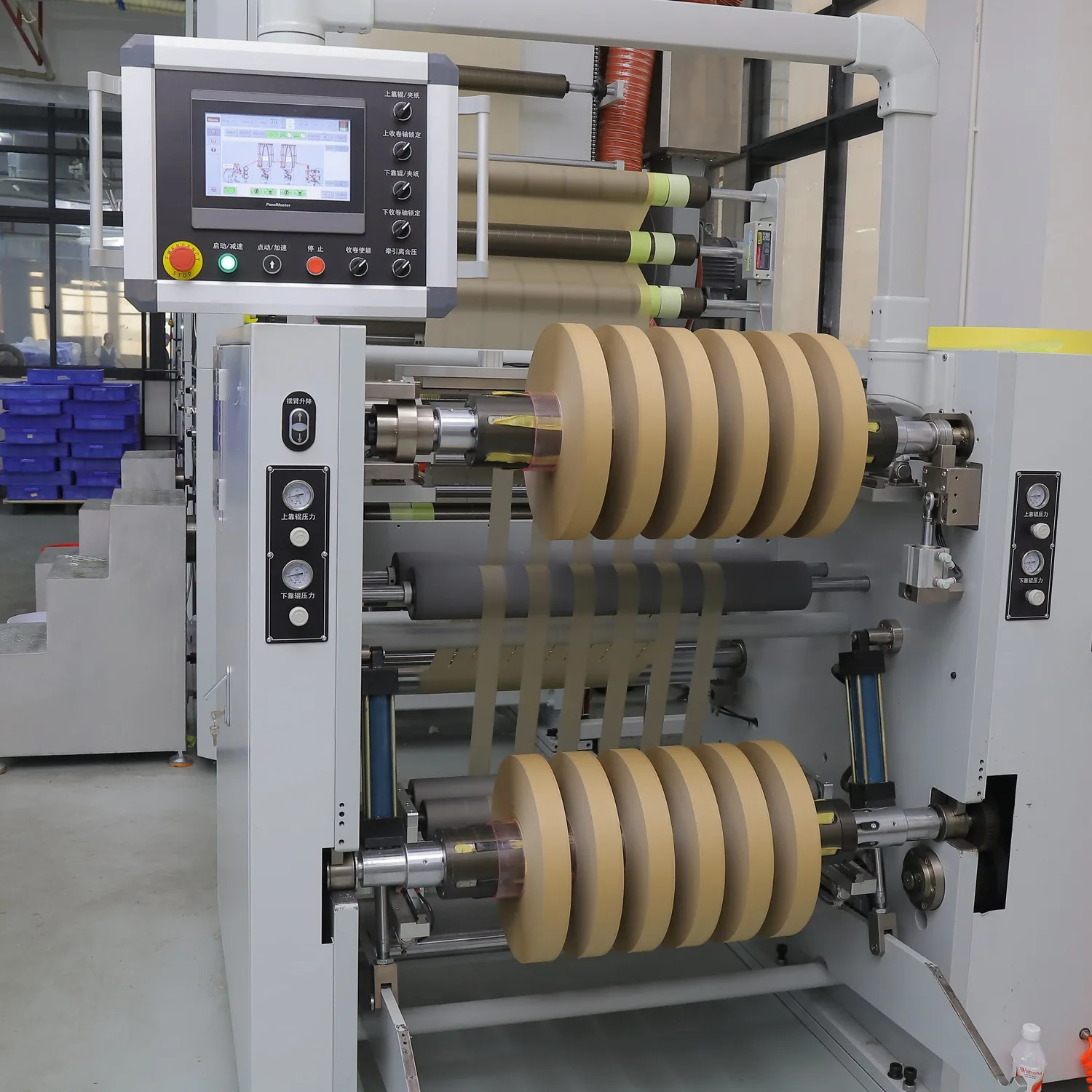 Paper slitting machine with multiple bobbin rolls