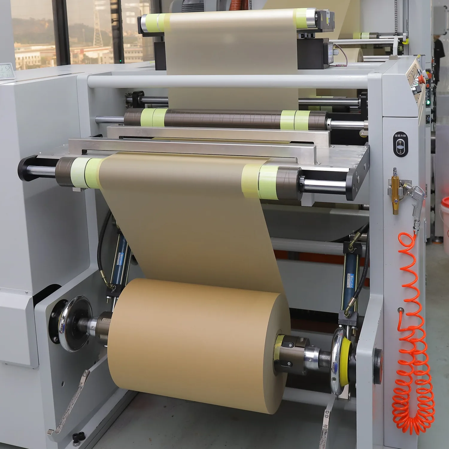 Paper web tension rollers on production machine