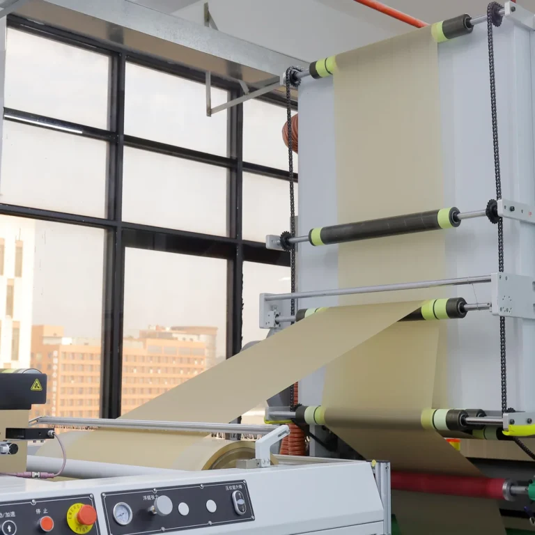 Ace Rolling roll to roll machine feeding paper web