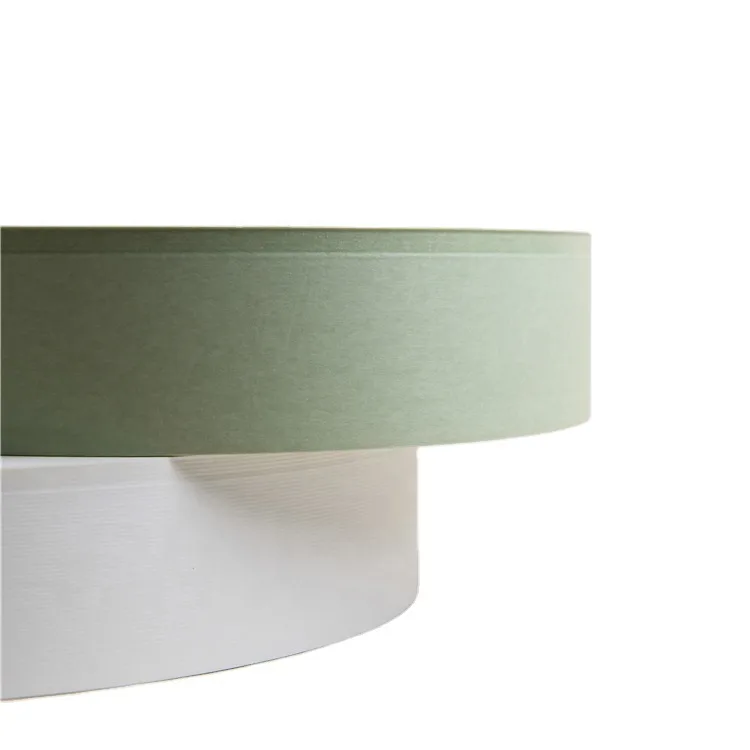Stacked industrial paper bobbins showing high-volume paper supply