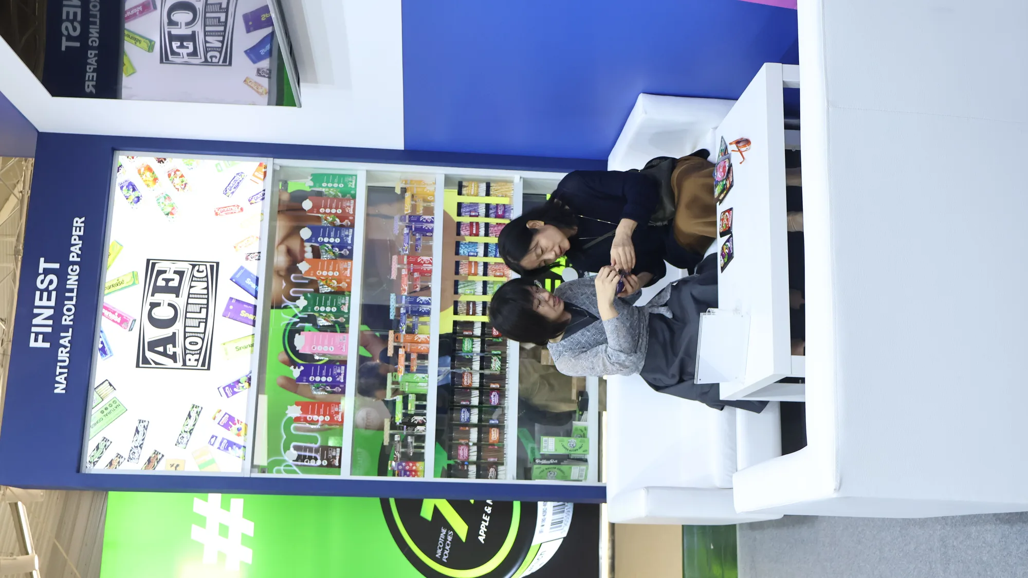 Ace Rolling trade-show booth displaying many rolling paper pack designs