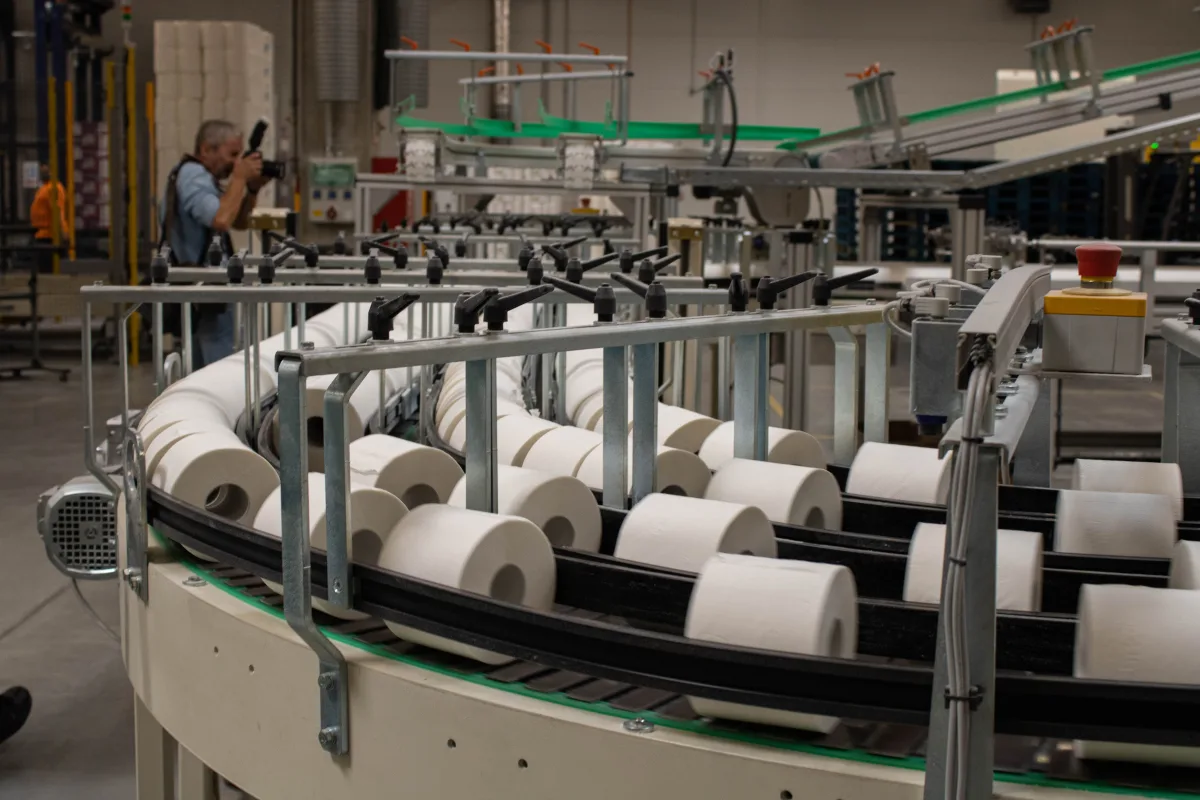 Automated paper roll production line in a factory setting