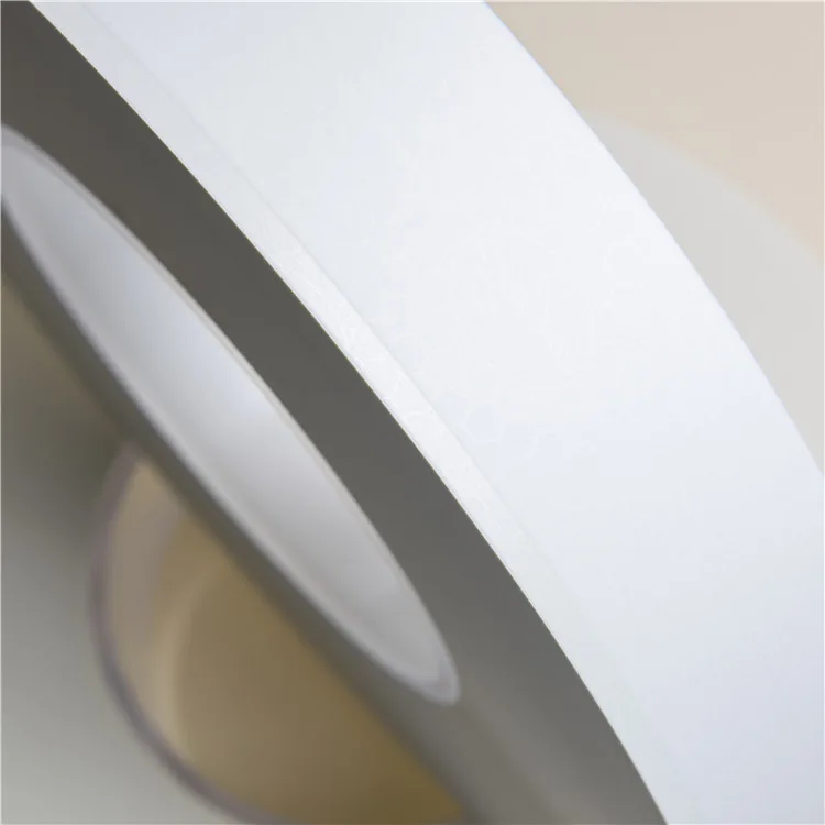 Close-up of ultra-thin white rolling paper bobbin stock