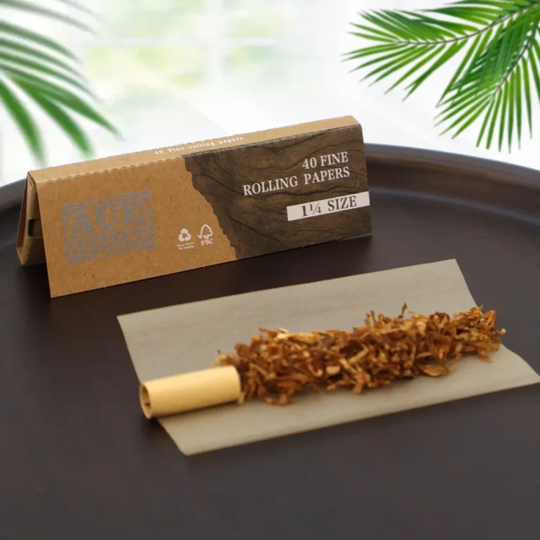 Ace fine 1 1/4 rolling paper booklet with leaf and tip staged for retail