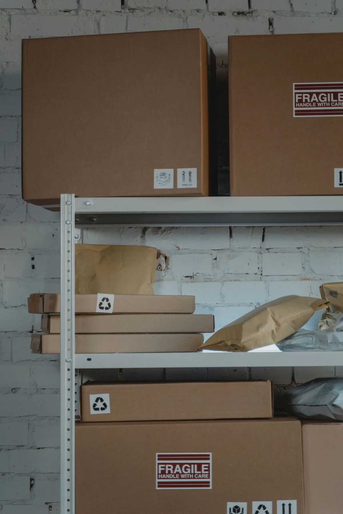Warehouse shelving with fragile export packaging boxes for rolling paper shipments