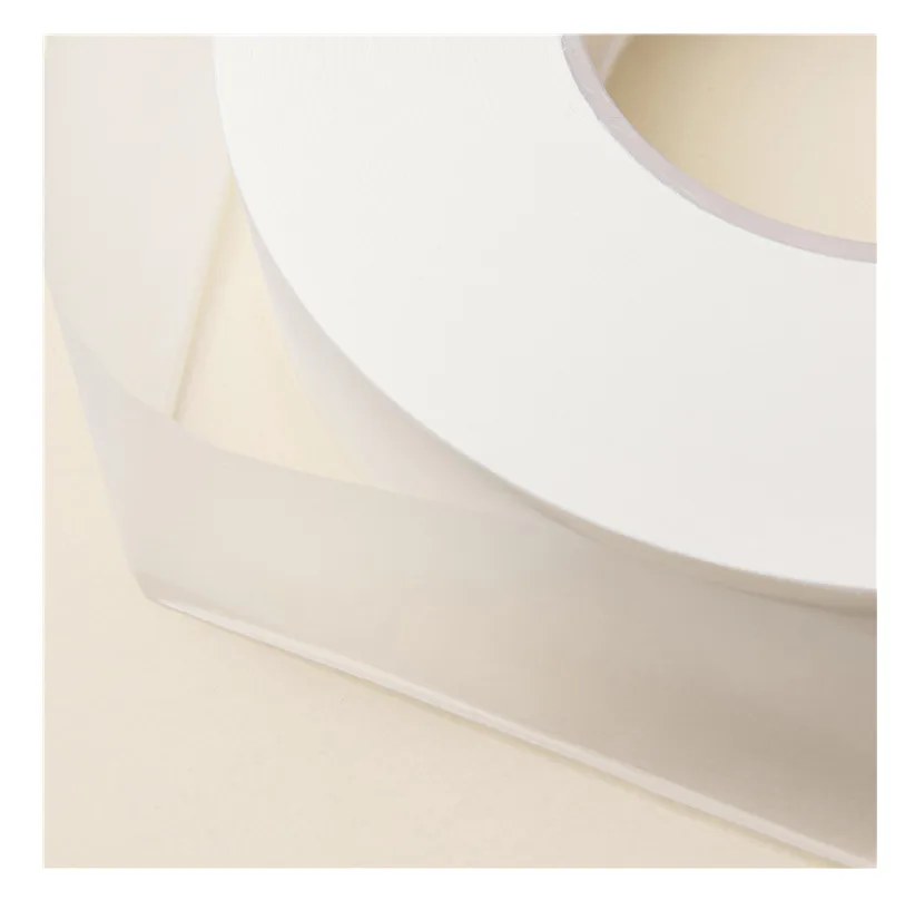 Industrial paper bobbins on a converting line, not a fill room