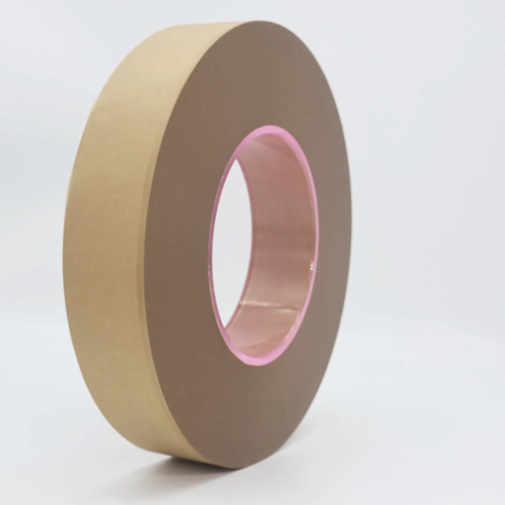 Industrial bobbin roll showing gum application across the paper web