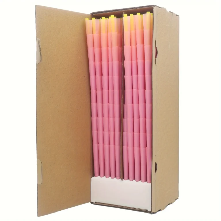 Pink empty paper cones nested in an open kraft box